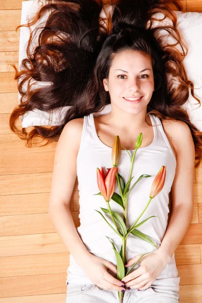 Young woman with lily — Stock Photo, Image